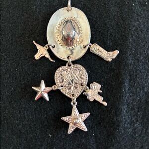 Western silver pendant